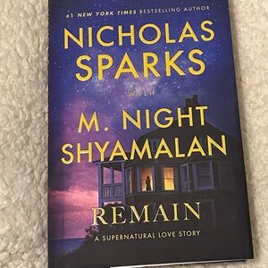 Nicholas Sparks 'Remain' Book Cover in Purple and Yellow